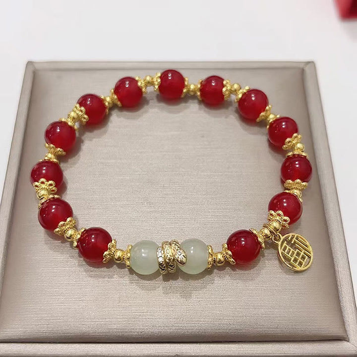 Braccialetto Buddha Stones Agata Rossa Giada Fu Carattere Anno del Serpente Calma