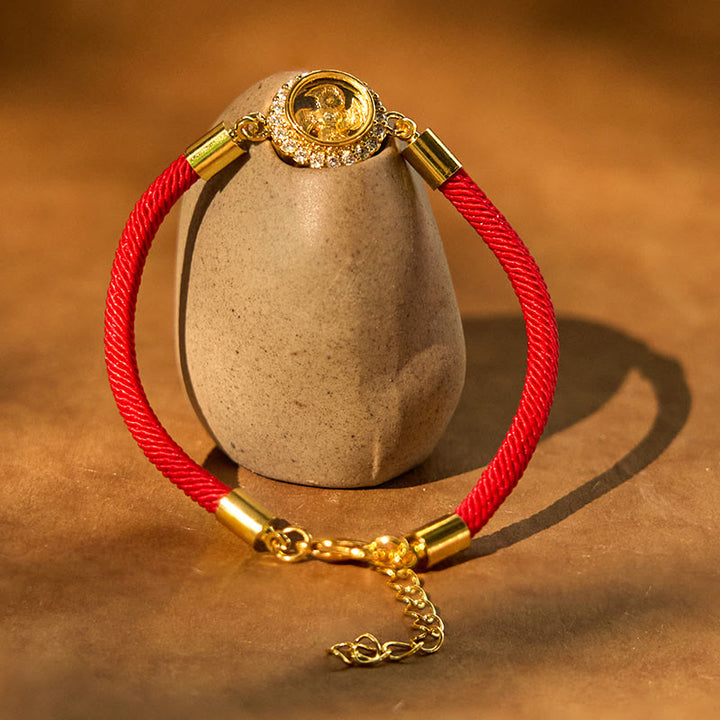 Buddha Stones Braccialetto intrecciato in rame rosso e ottone con mulinello girevole Feng Sheng Shui Qi Protection