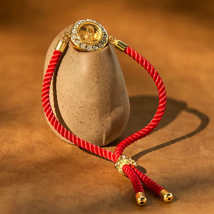 Buddha Stones Rame Ottone Feng Sheng Shui Qi Mulino a vento girevole Braccialetto intrecciato con corda rossa Fede