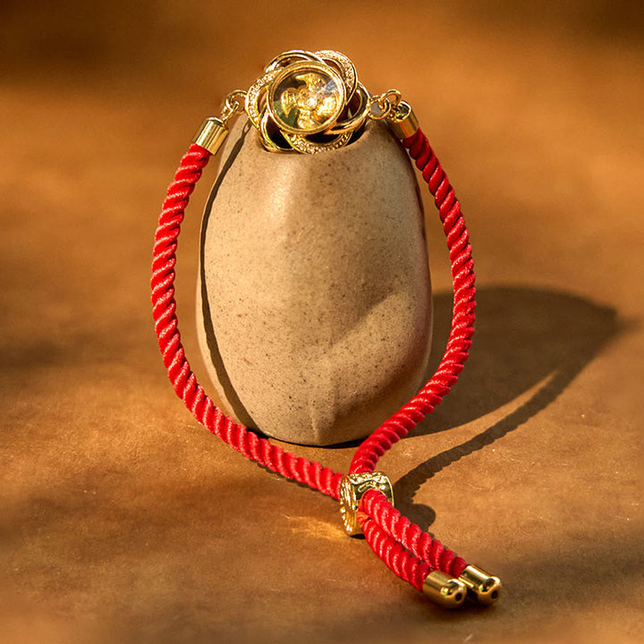 Buddha Stones Rotanti Prugna Rosso Corda Rame Ottone Mulino a Vento Feng Sheng Shui Qi Protezione Bracciale Intrecciato