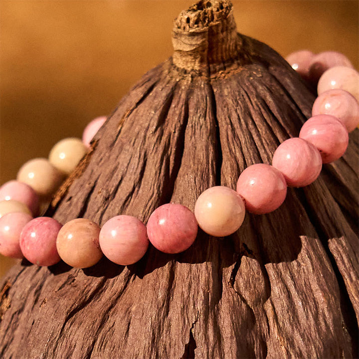 Braccialetto di guarigione delle relazioni Buddha Stones e rodonite