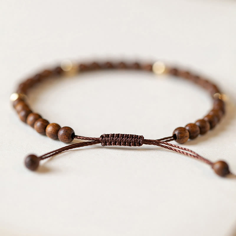 Braccialetto di protezione con perline di rame placcate in oro 14K e legno di sandalo ultrasottile da 4 mm Buddha Stones