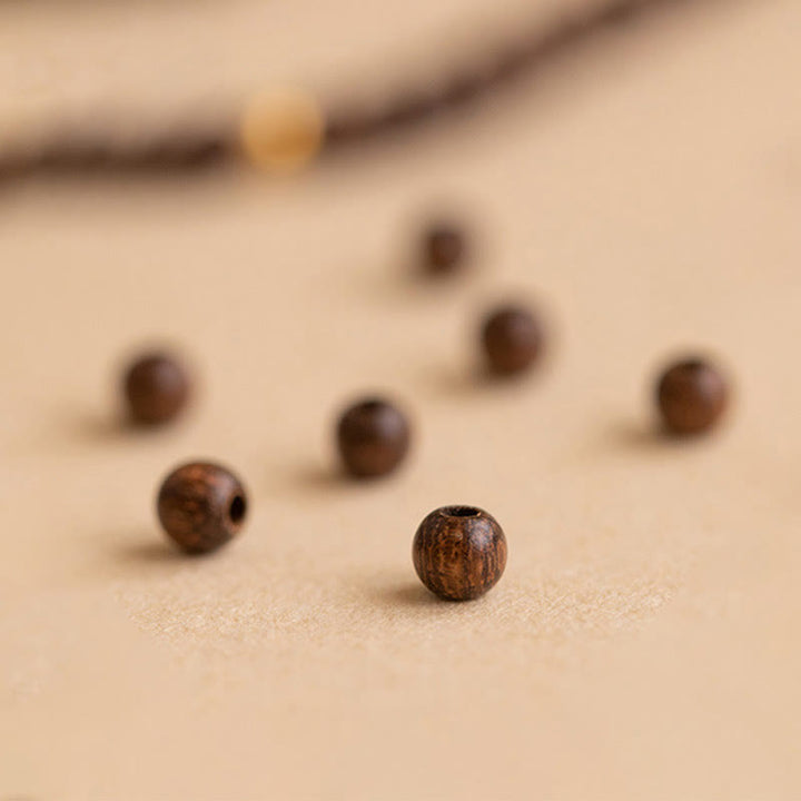Braccialetto di protezione con perline di rame placcate in oro 14K e legno di sandalo ultrasottile da 4 mm Buddha Stones