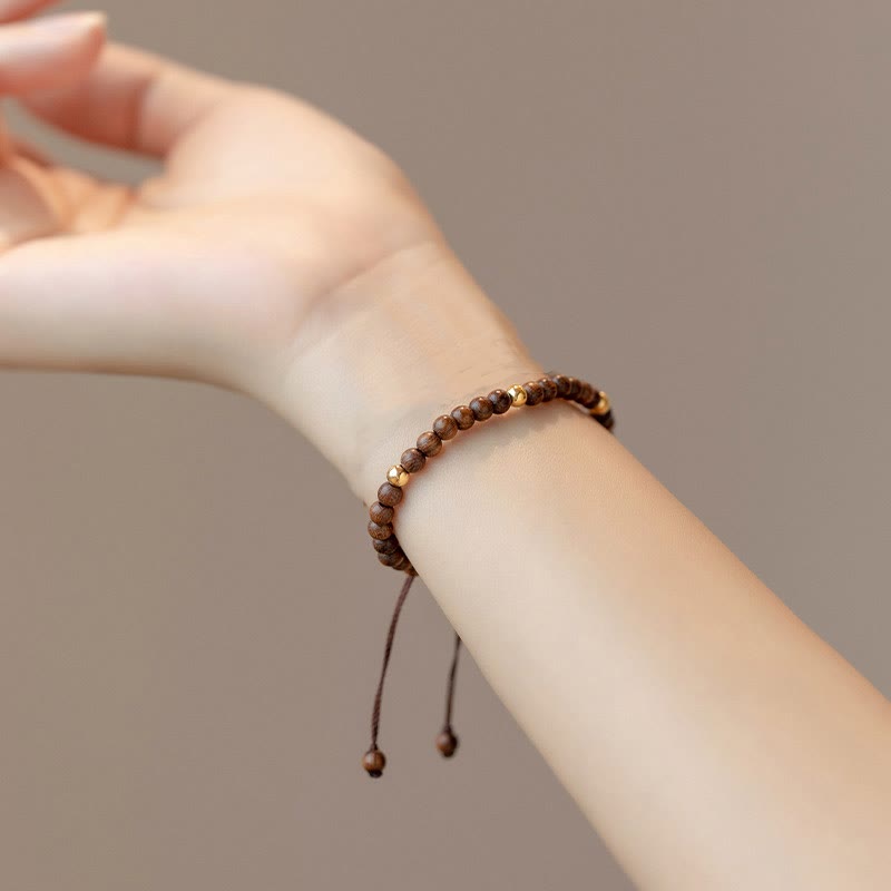 Braccialetto di protezione con perline di rame placcate in oro 14K e legno di sandalo ultrasottile da 4 mm Buddha Stones