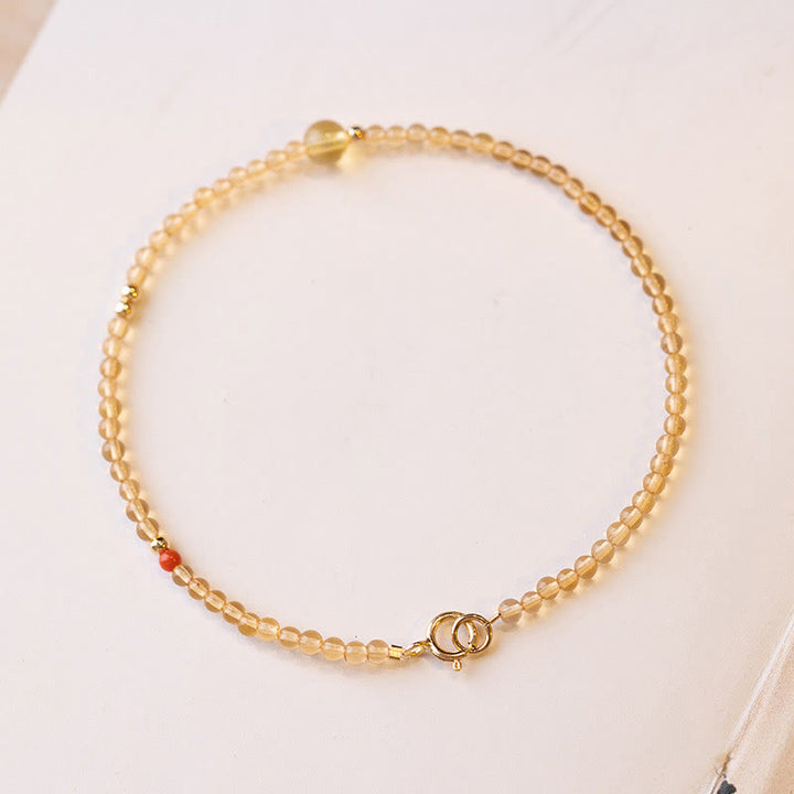 Braccialetto di protezione con perline di rame placcate in oro 14K e citrino ultrasottile da 2 mm Buddha Stones