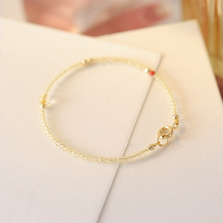 Braccialetto di protezione con perline di rame placcate in oro 14K e citrino ultrasottile da 2 mm Buddha Stones