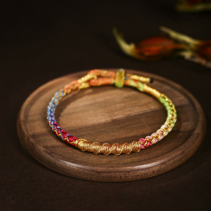 Buddha Stones Tibetano Colorato Filo d'Oro Drago Scaglia Nodo Protezione Bracciale Intrecciato