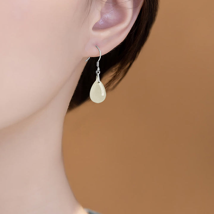 Orecchini pendenti Buddha Stones in argento sterling 925 con motivo a goccia d'acqua e giada, motivo fortuna e prosperità