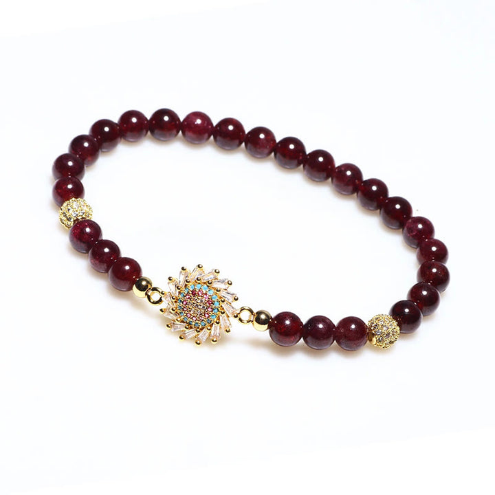 Braccialetto di protezione con perline di zircone e fiore di granato naturale Buddha Stones