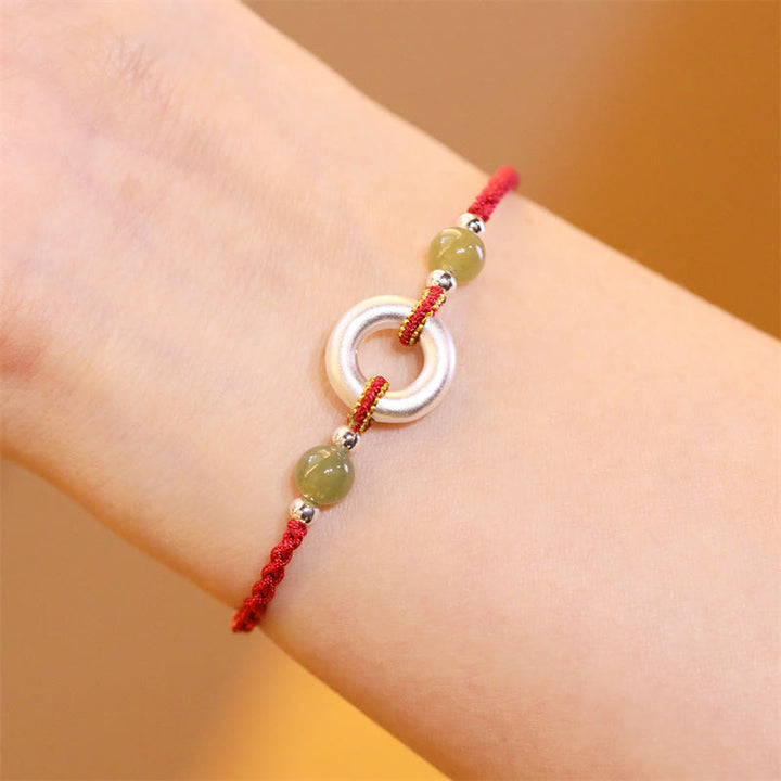 Braccialetto in corda rossa fatto a mano con fibbia della pace in argento sterling 999 con Buddha Stones e giada Hetian