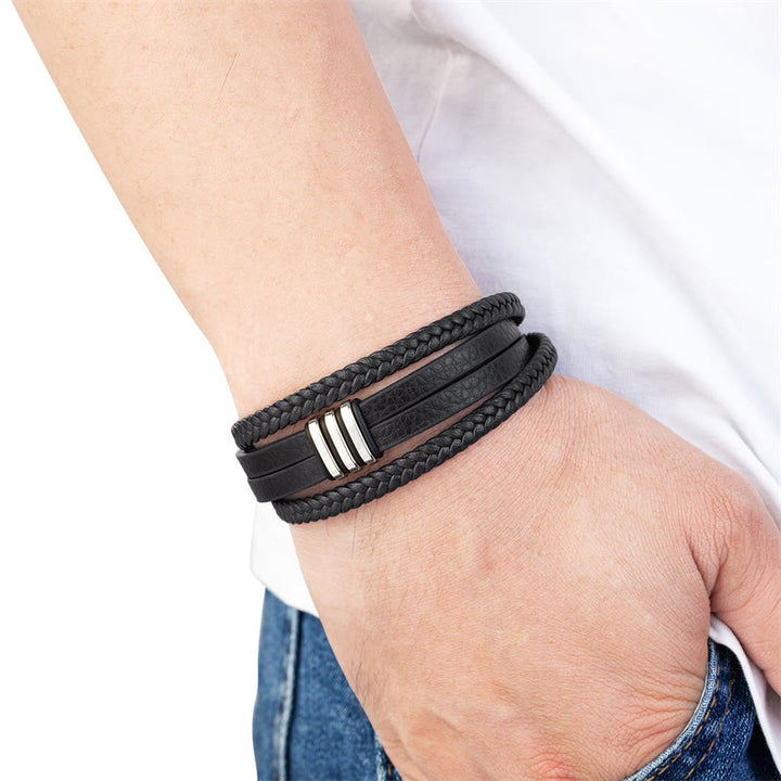 Bracciale con fibbia in acciaio al titanio calmo in pelle intrecciata fatta a mano Buddha Stones