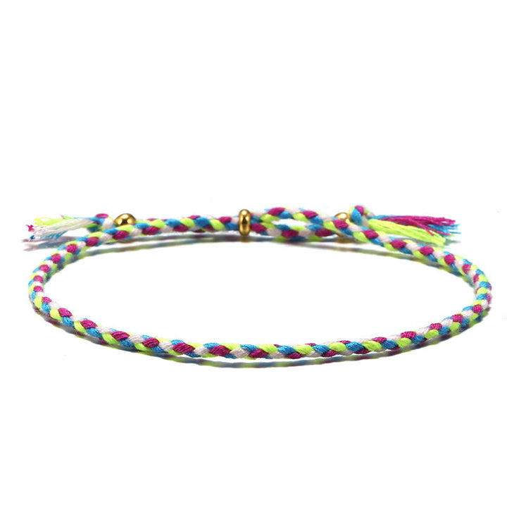 Braccialetto dell'armonia regolabile con nappa intrecciata in corda colorata fatta a mano di Buddha Stones