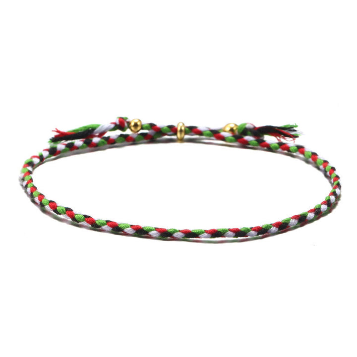 Braccialetto dell'armonia regolabile con nappa intrecciata in corda colorata fatta a mano di Buddha Stones