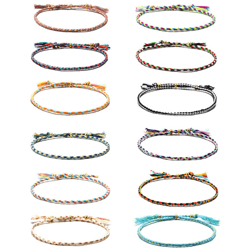 Braccialetto dell'armonia regolabile con nappa intrecciata in corda colorata fatta a mano di Buddha Stones