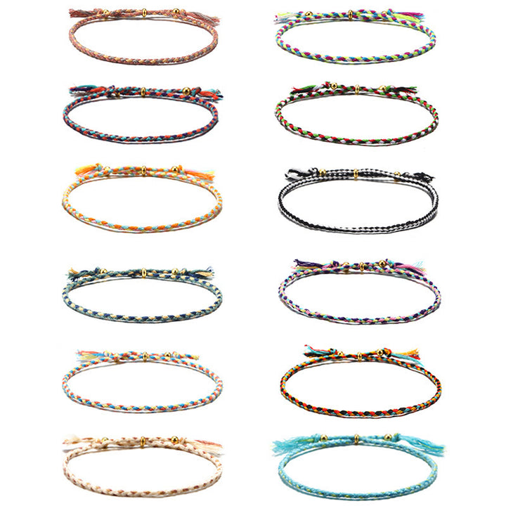 Braccialetto dell'armonia regolabile con nappa intrecciata in corda colorata fatta a mano di Buddha Stones