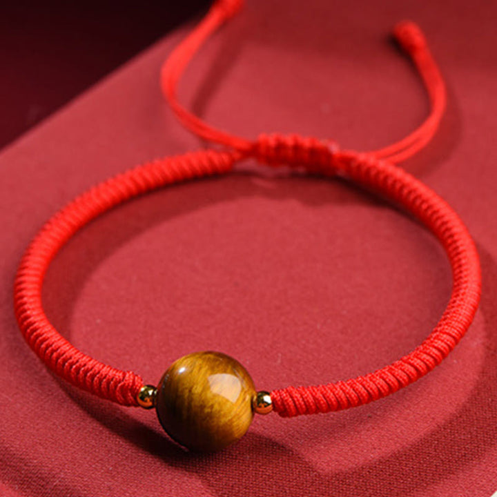 Braccialetto di corda di protezione della fortuna con perline di occhio di tigre fatto a mano Buddha Stones