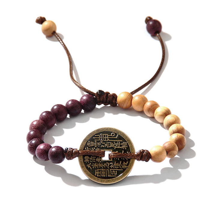 Buddha Stones Legno di ebano Legno di wenge Fantasmi di montagna Spendi soldi Bagua Moneta di rame Bracciale della pace