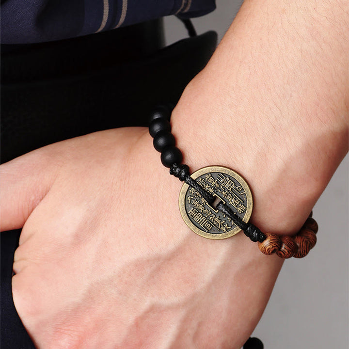 Buddha Stones Legno di ebano Legno di wenge Fantasmi di montagna Spendi soldi Bagua Moneta di rame Bracciale della pace