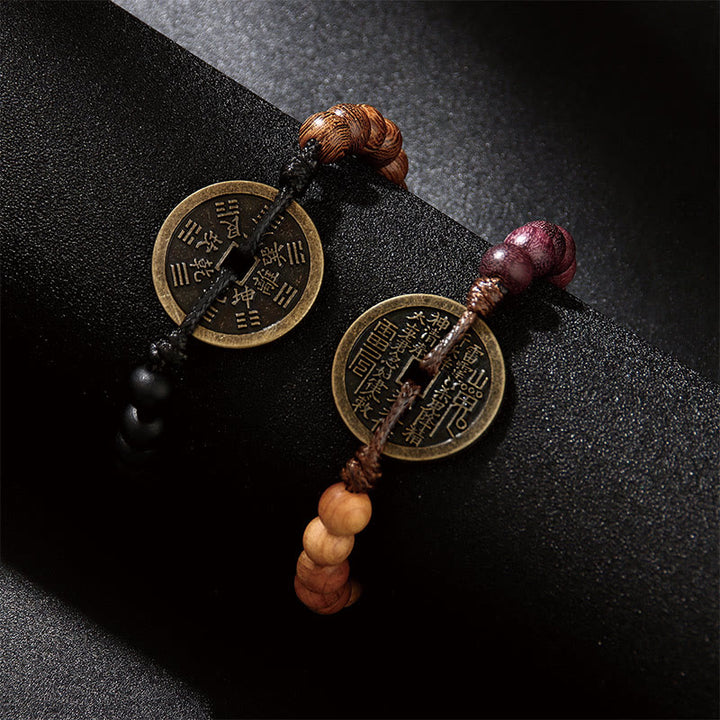 Buddha Stones Legno di ebano Legno di wenge Fantasmi di montagna Spendi soldi Bagua Moneta di rame Bracciale della pace