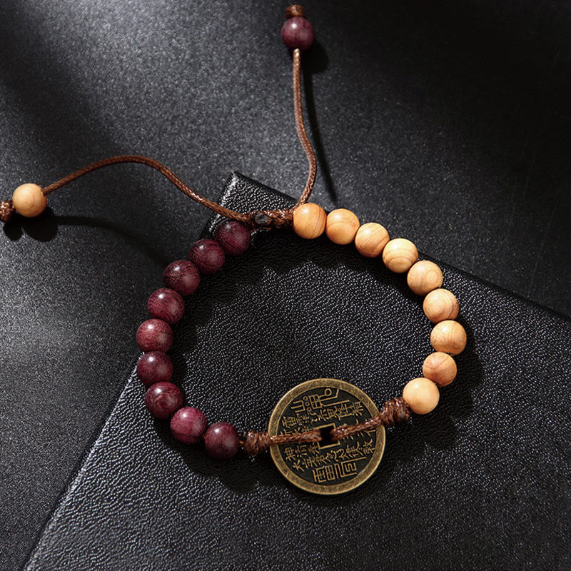Buddha Stones Legno di ebano Legno di wenge Fantasmi di montagna Spendi soldi Bagua Moneta di rame Bracciale della pace