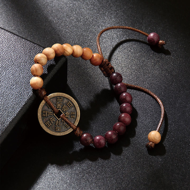 Buddha Stones Legno di ebano Legno di wenge Fantasmi di montagna Spendi soldi Bagua Moneta di rame Bracciale della pace