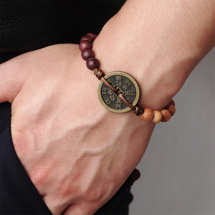 Buddha Stones Legno di ebano Legno di wenge Fantasmi di montagna Spendi soldi Bagua Moneta di rame Bracciale della pace
