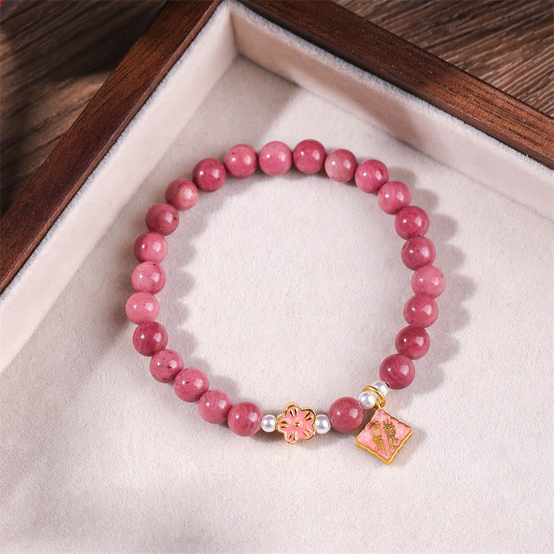 Braccialetto energetico amorevole con fiori di pesco e rodonite Buddha Stones