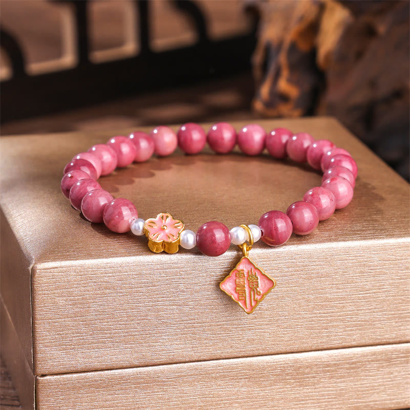Braccialetto energetico amorevole con fiori di pesco e rodonite Buddha Stones