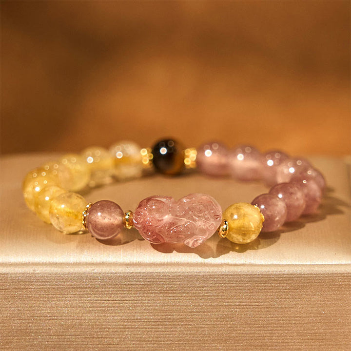 Braccialetto di guarigione con perle di quarzo rutilato Pixiu, Buddha Stones e quarzo fragola