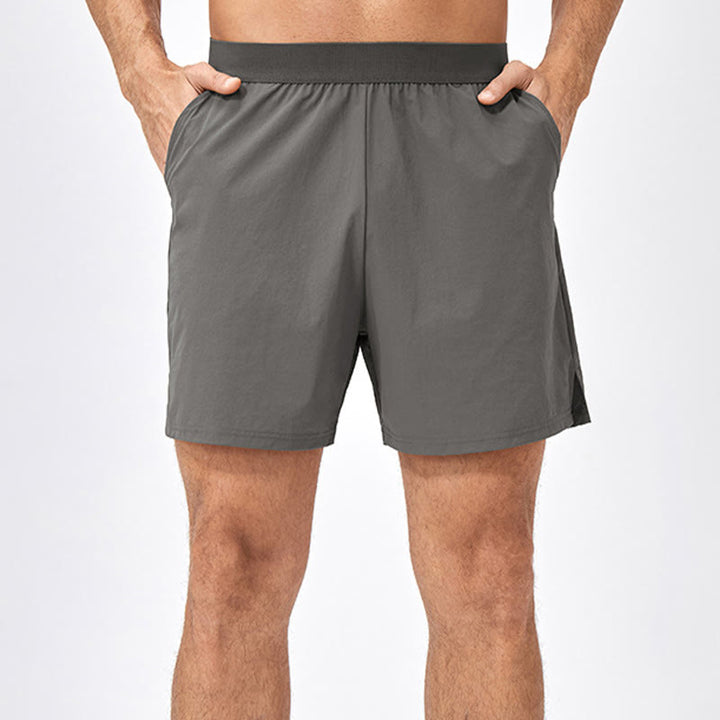 Pantaloncini sportivi casuali larghi in nylon ad asciugatura rapida da uomo Buddha Stones con tasche
