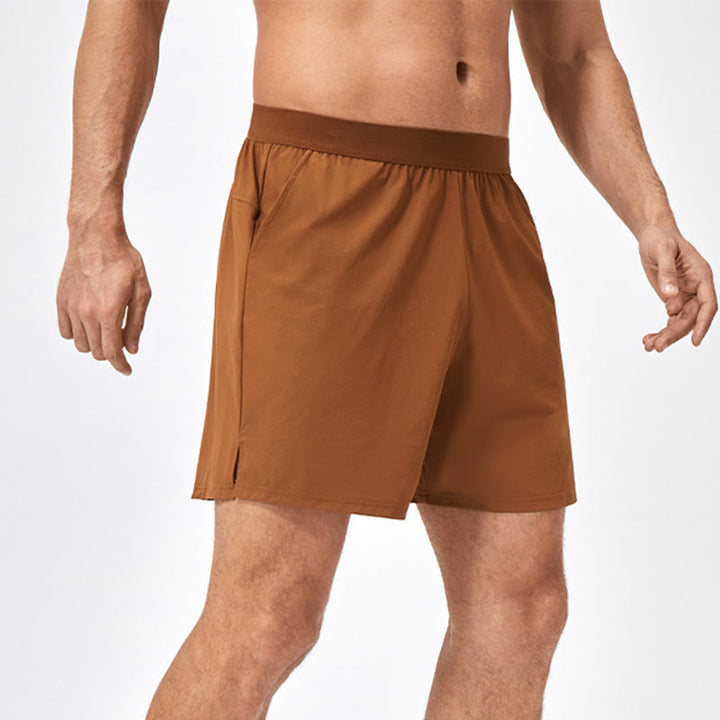 Pantaloncini sportivi casuali larghi in nylon ad asciugatura rapida da uomo Buddha Stones con tasche