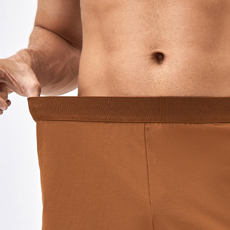 Pantaloncini sportivi casuali larghi in nylon ad asciugatura rapida da uomo Buddha Stones con tasche
