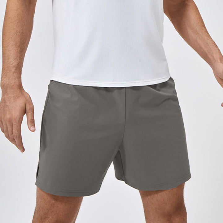 Pantaloncini sportivi casuali larghi in nylon ad asciugatura rapida da uomo Buddha Stones con tasche