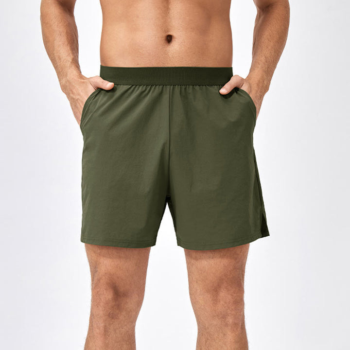 Pantaloncini sportivi casuali larghi in nylon ad asciugatura rapida da uomo Buddha Stones con tasche