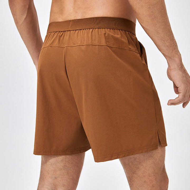 Pantaloncini sportivi casuali larghi in nylon ad asciugatura rapida da uomo Buddha Stones con tasche