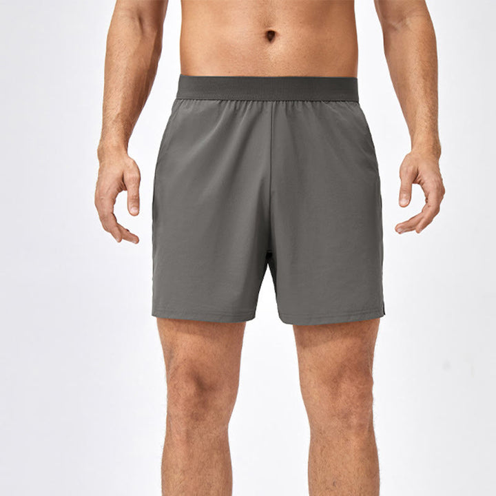 Pantaloncini sportivi casuali larghi in nylon ad asciugatura rapida da uomo Buddha Stones con tasche