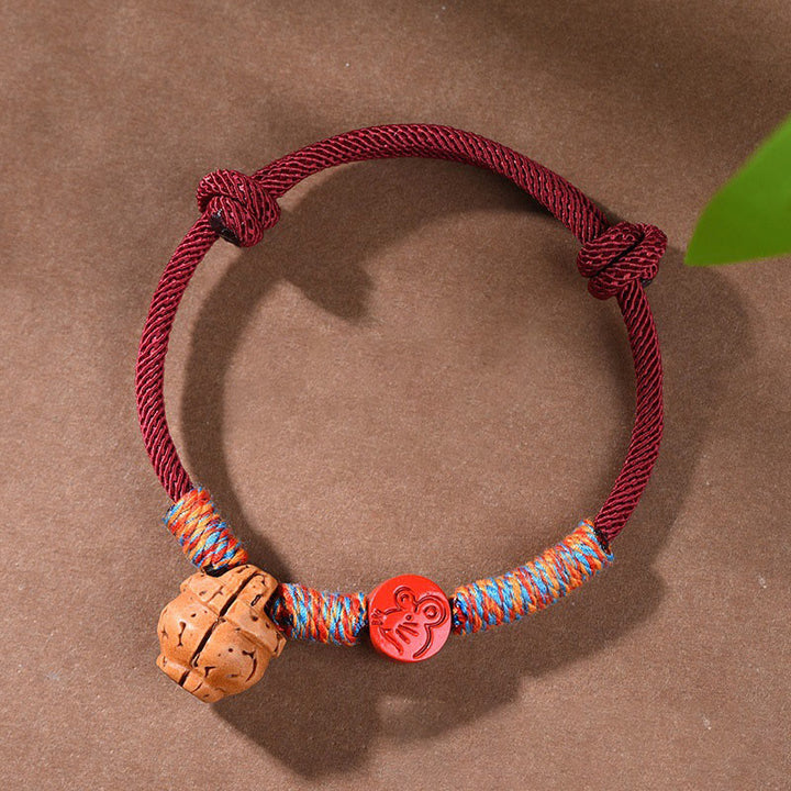 Braccialetto della fortuna fatto a mano con Buddha Stones, zodiaco cinese, filo rosso, nocciolo di pesca, cinabro