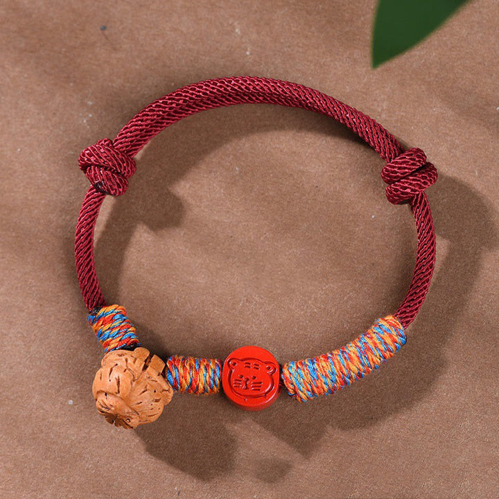 Braccialetto della fortuna fatto a mano con Buddha Stones, zodiaco cinese, filo rosso, nocciolo di pesca, cinabro