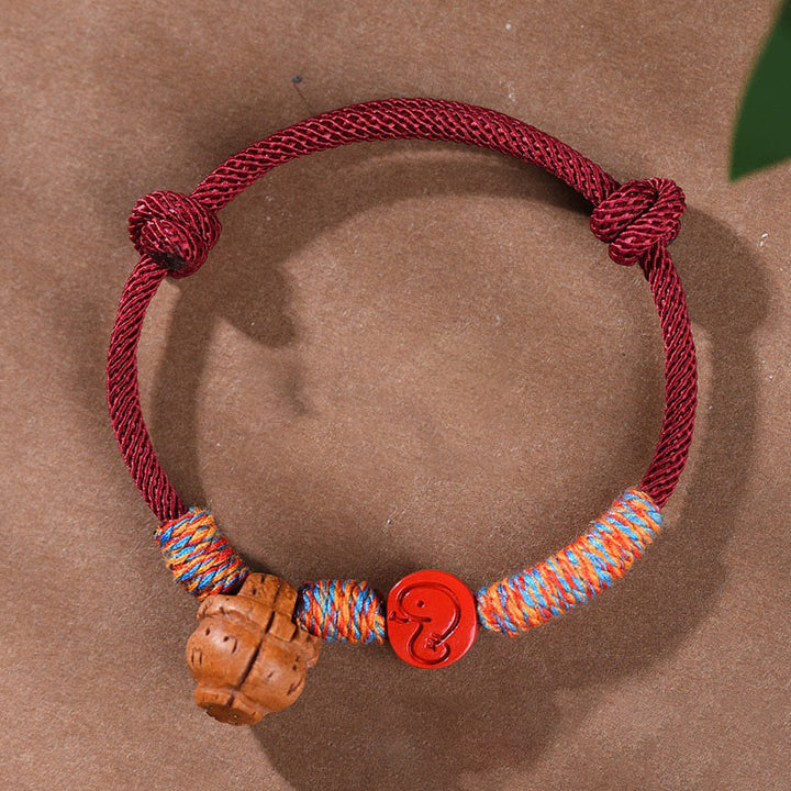 Braccialetto della fortuna fatto a mano con Buddha Stones, zodiaco cinese, filo rosso, nocciolo di pesca, cinabro