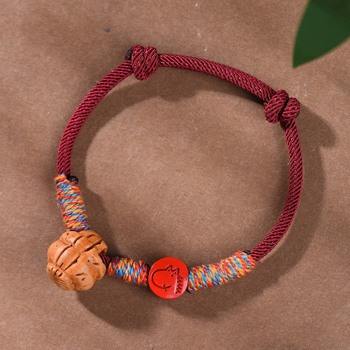 Braccialetto della fortuna fatto a mano con Buddha Stones, zodiaco cinese, filo rosso, nocciolo di pesca, cinabro