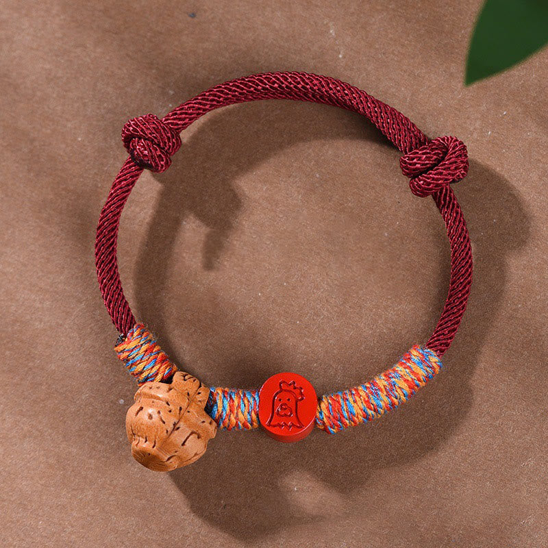 Braccialetto della fortuna fatto a mano con Buddha Stones, zodiaco cinese, filo rosso, nocciolo di pesca, cinabro