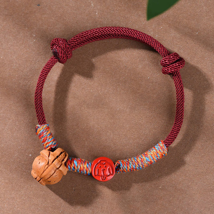 Braccialetto della fortuna fatto a mano con Buddha Stones, zodiaco cinese, filo rosso, nocciolo di pesca, cinabro