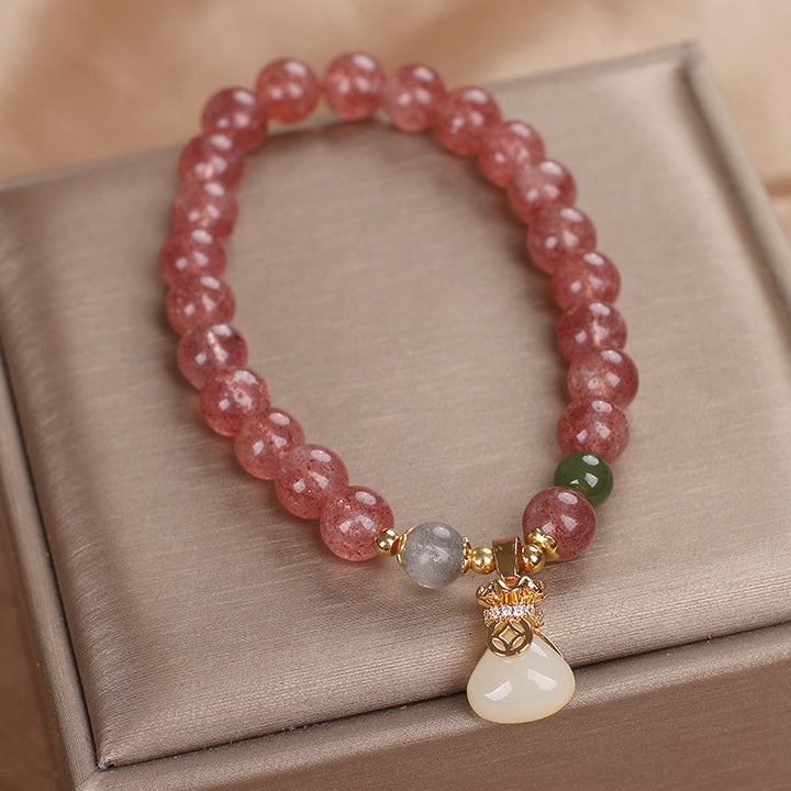 Braccialetto positivo con ciondolo a forma di sacco di soldi in quarzo fragola naturale Buddha Stones