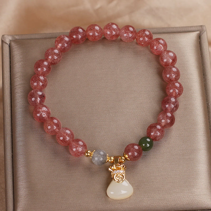 Braccialetto positivo con ciondolo a forma di sacco di soldi in quarzo fragola naturale Buddha Stones
