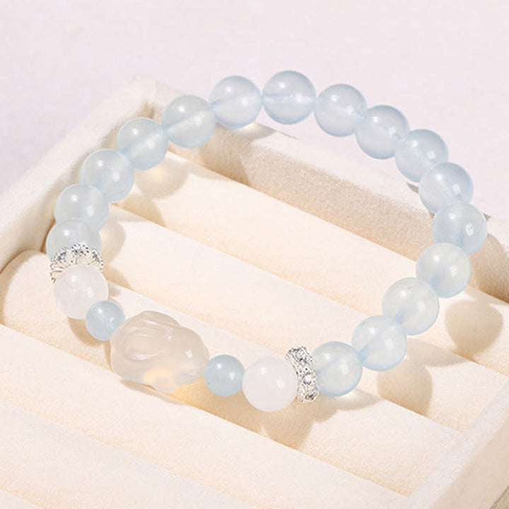 Bracciale Buddha Stones Calcedonio blu Agata bianca Coniglio Equilibrio emotivo