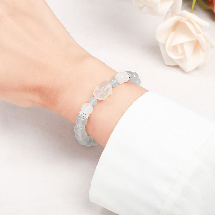 Bracciale Buddha Stones Calcedonio blu Agata bianca Coniglio Equilibrio emotivo