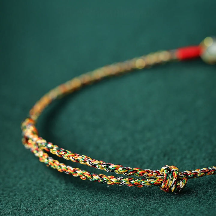Braccialetto di corda colorata con fibbia di pace in giada e Buddha Stones fatto a mano