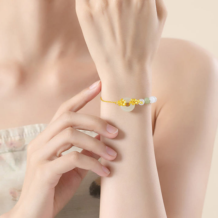 Braccialetto della fortuna con fibbia della pace in giada naturale Hetian in argento sterling 999 Buddha Stones