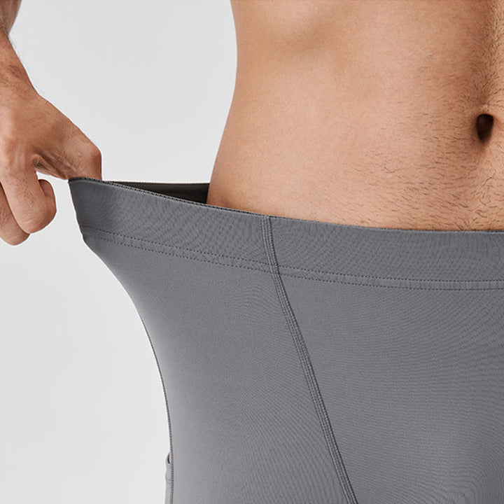 Pantaloni sportivi da uomo elastici e traspiranti con vita alta, tinta unita, Buddha Stones, con tasca posteriore con cerniera