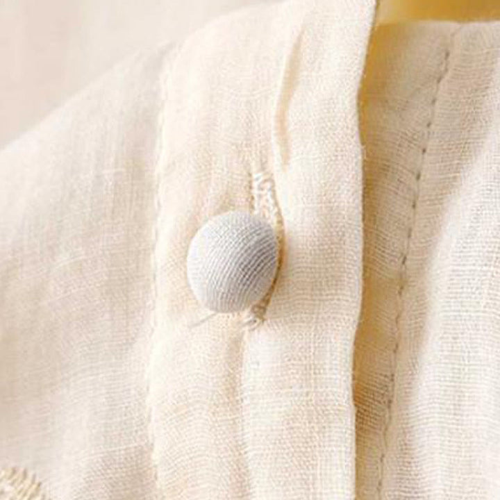 Camicia da donna a maniche corte con scollo rotondo e motivo floreale ricamato a petali, Buddha Stones. - image 7